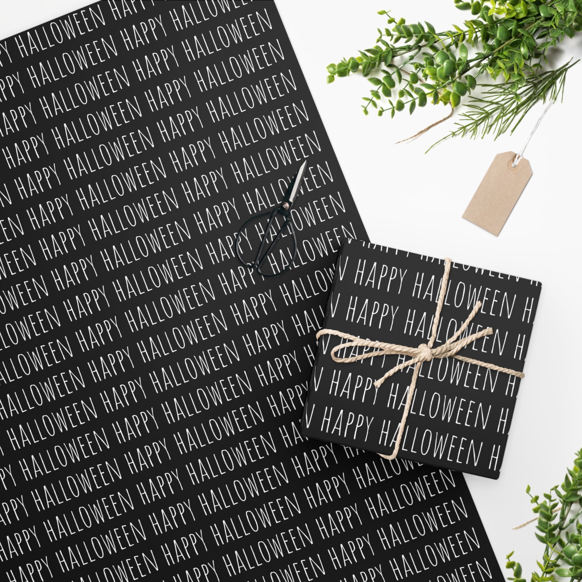 Chic Happy Halloween Wrapping Paper White on Black - Chic Wrapping Paper for Halloween Gifts and Festive Gifting. Available in 2 sizes.