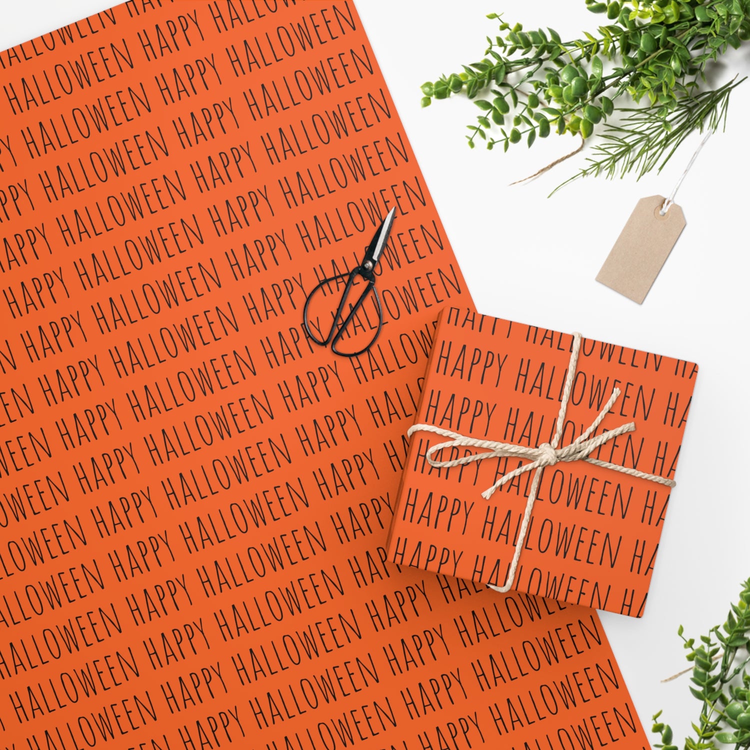 Chic Happy Halloween Wrapping Paper Black on Orange Chic Wrapping Paper for Halloween Gifts and Festive Giving. Available in 2 sizes.