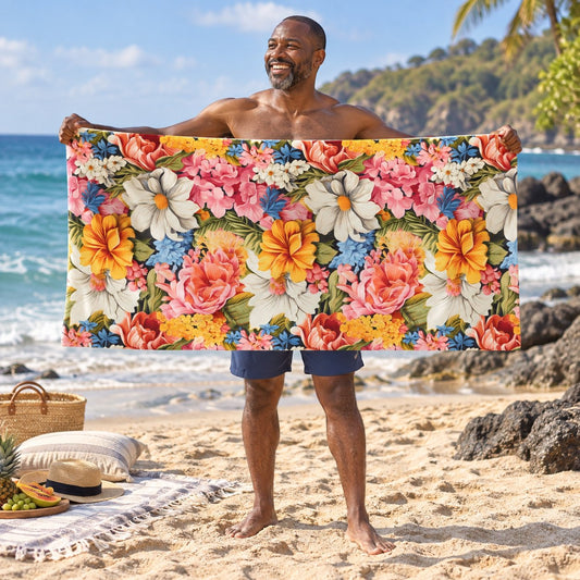 Chic Floral beach towel, shown with an adult in a summer setting.