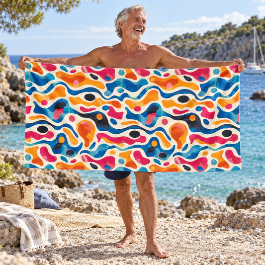 Oceanic Color Splash beach towel, shown with an adult in a summer setting.