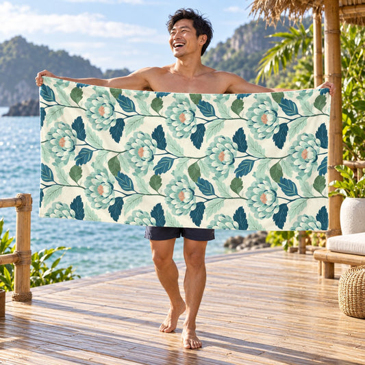 Zen Flower beach towel, shown with an adult in a summer setting.