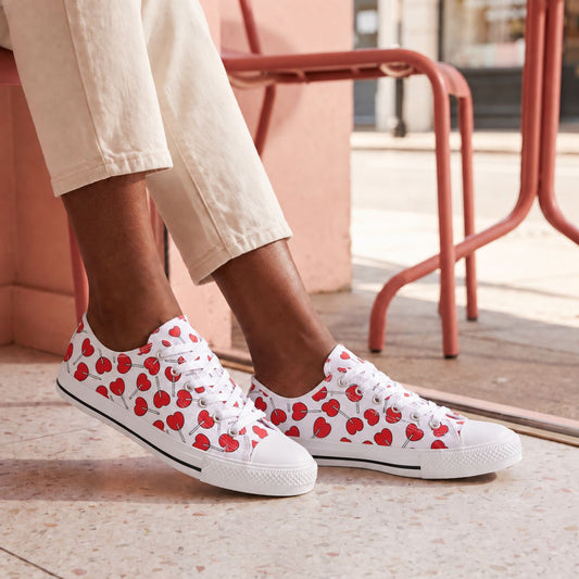 Sweetheart Lollipops Ladies' Low Top Sneakers. Lifestyle scene: Neighborhood gelato pause