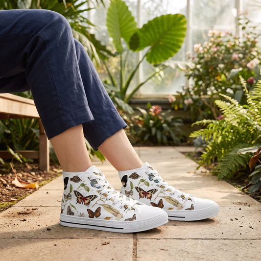 Botanical Butterflies Ladies' High Top Sneakers — Butterfly conservatory walkway; pale tiled path, lush greenery behind glass, filtered daylight