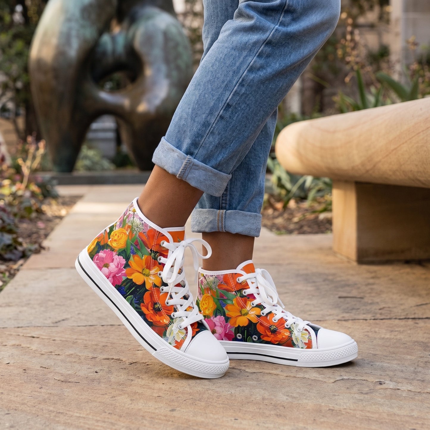 Blossom Blaze Ladies' High Top Sneakers — City sculpture garden; smooth sandstone bench, bronze abstract form softly behind, breezy afternoon