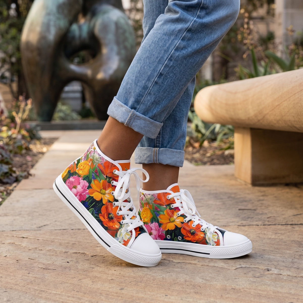 Blossom Blaze Ladies' High Top Sneakers — City sculpture garden; smooth sandstone bench, bronze abstract form softly behind, breezy afternoon