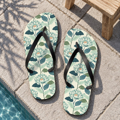Zen Flower Flip Flops. Lifestyle scene: Zen courtyard plunge pool; dry light grey stone, bamboo shadow, simple wood stool