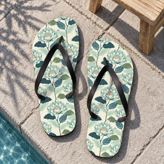 Zen Flower Flip Flops. Lifestyle scene: Zen courtyard plunge pool; dry light grey stone, bamboo shadow, simple wood stool