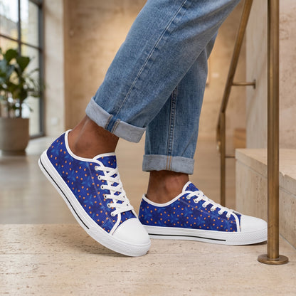 GeoSpark Men's Low Top Sneakers. Lifestyle scene: Urban gallery stair landing; dry pale stone, brushed bronze handrail, clean daylight