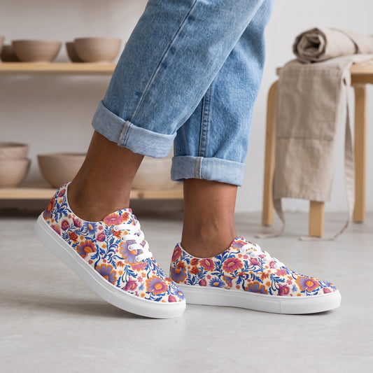Spring Whimsy Ladies' Lace-up Canvas Sneakers — Airy pottery studio; clean concrete floor, clay bowls on distant shelving, rolled neutral apron on stool