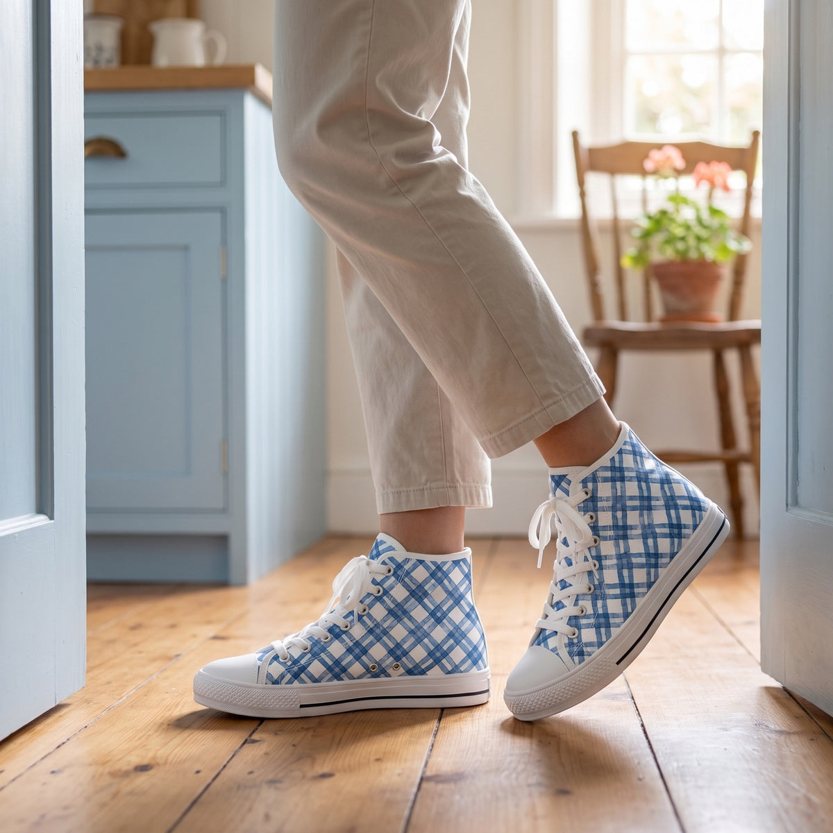 Blue Breeze Gingham Ladies' High Top Sneakers — Cottage breakfast-room doorway; warm pine floor, sky-blue cabinetry, soft morning sun
