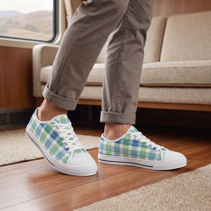 Spring Mist Plaid Men's Low Top Sneakers. Lifestyle scene: Country train carriage lounge; warm wood floor, oatmeal seat, soft window landscape