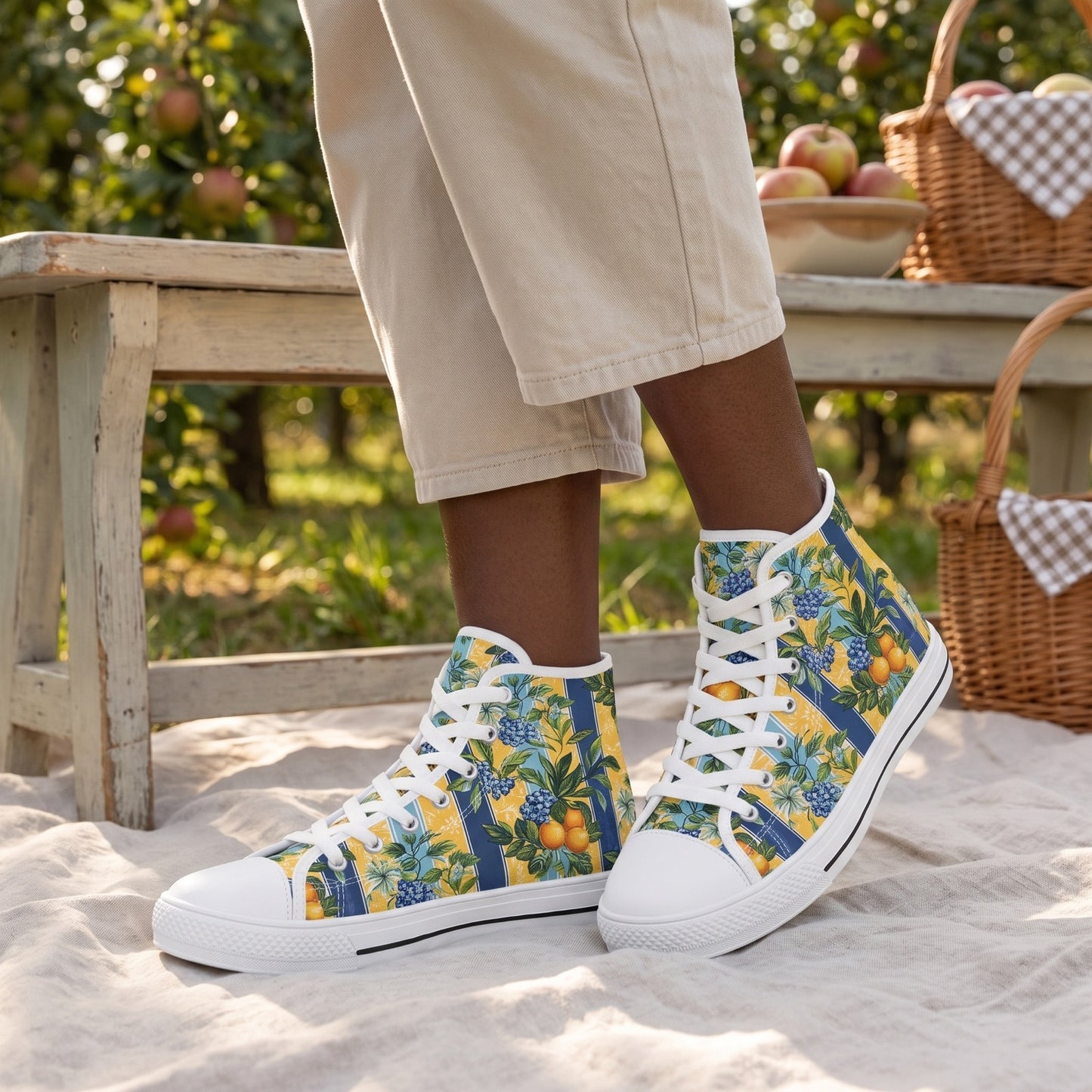 Sunny Orchard Stripes Ladies' High Top Sneakers — Orchard picnic pause; pale wooden bench, linen picnic blanket, apple trees softly behind