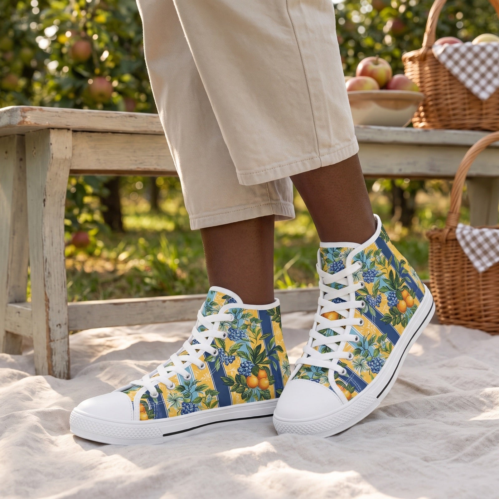 Sunny Orchard Stripes Ladies' High Top Sneakers — Orchard picnic pause; pale wooden bench, linen picnic blanket, apple trees softly behind