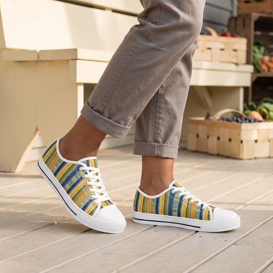 Summer Stripes Delight Ladies' Low Top Sneakers. Lifestyle scene: Summer produce stand porch; pale timber boards, cream bench, berry crates blurred at edge