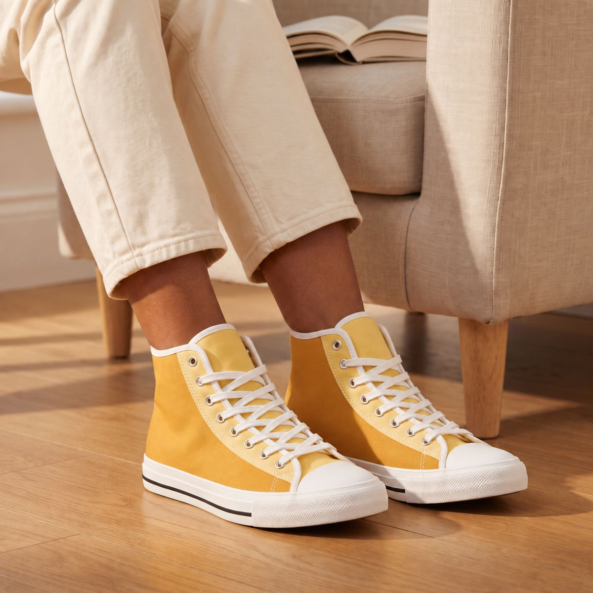 Buttercup Ladies' Two-Tone High Top Sneakers. Lifestyle scene: Sunroom reading break