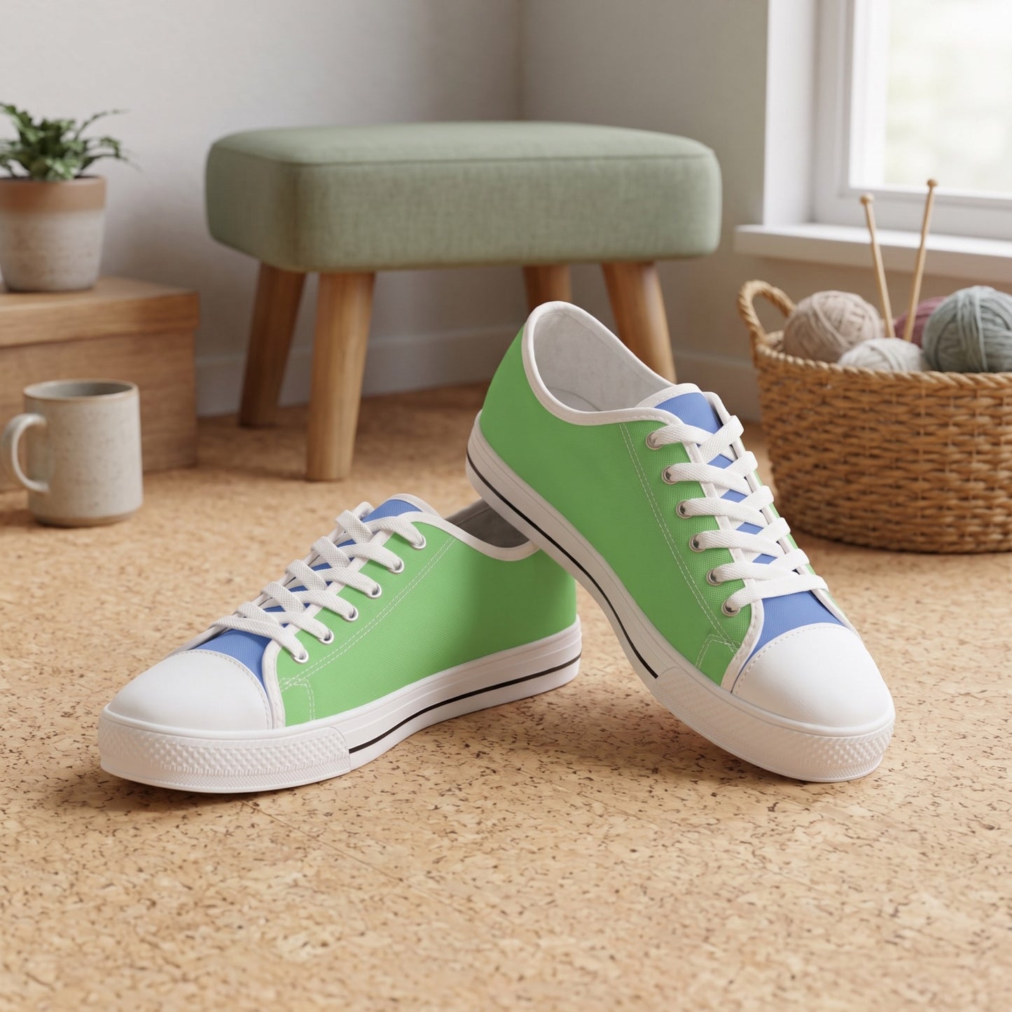 Meadow Stream Ladies' Two-Tone Low Top Sneakers. Lifestyle scene: Craft workshop break corner; light cork floor, sage stool, soft window light