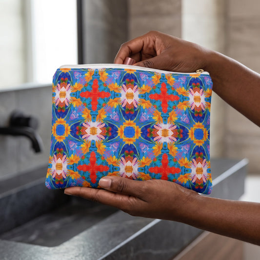 Small Floral Tapestry Wanderlust accessory pouch (8.35 × 5.98 inches) in use: woman retrieves a lipstick from pouch resting lightly on her open palm. Lifestyle mockup with hands showing scale.
