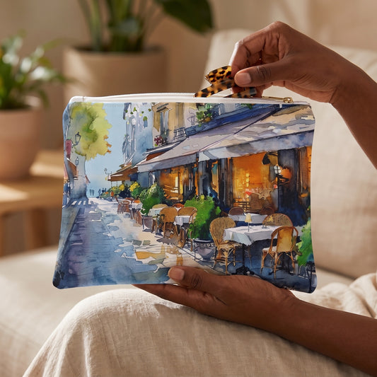 Small Parisian Bistro Bliss accessory pouch (8.35 × 5.98 inches) in use: woman takes a hair clip from pouch cradled in her hand. Lifestyle mockup with hands showing scale.