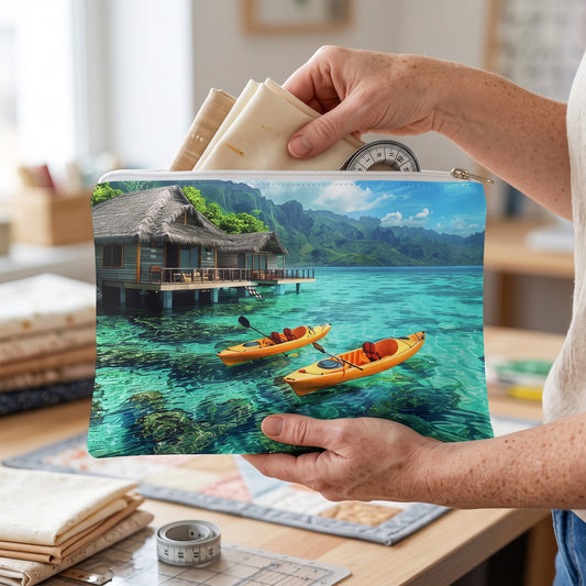 Large Tropical Serenity accessory pouch (11.81 × 8.35 inches) in use: hands organize fabric swatches and a measuring tape inside pouch. Lifestyle mockup with hands showing scale.