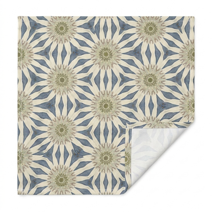 Close-up of Celestial Harmony cotton twill table runner showing the printed face, hemmed edge, white seam thread, and natural-white unprinted reverse