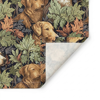 Close-up of Classic English Dog Tapestry cotton twill table runner showing the printed face, hemmed edge, white seam thread, and natural-white unprinted reverse