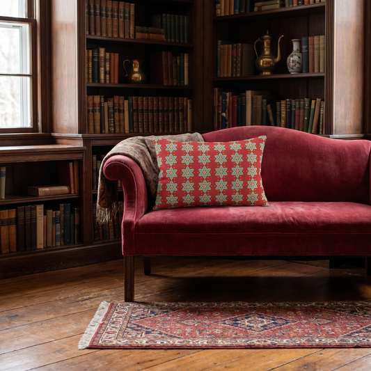 Cranberry Blossom Arabesque lumbar pillow in a styled room