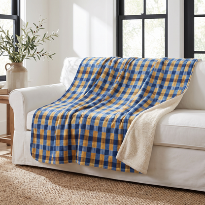 Modern Gingham sherpa fleece blanket on a white slipcovered sofa in a modern farmhouse living room