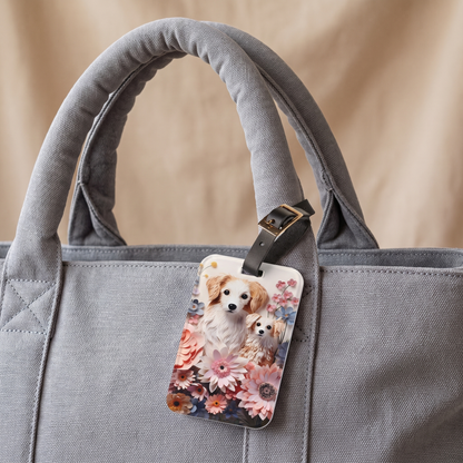 Paws and Petals acrylic luggage tag at true size on a dove-grey canvas travel tote