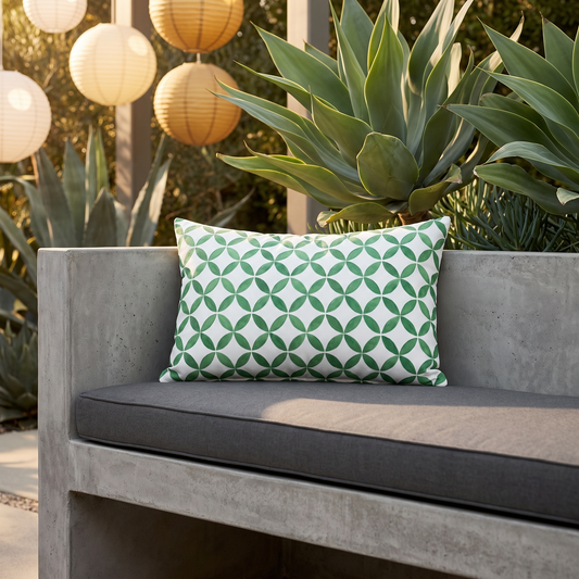 Coin Toss Chic outdoor lumbar pillow styled in a sunlit outdoor setting