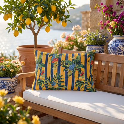 Riviera Fruitscape lumbar outdoor pillow styled in a sunlit outdoor setting