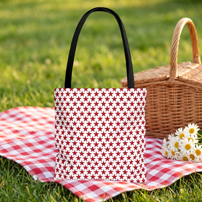 Star-Spangled Sparkle Tote Bag on a red gingham picnic blanket beside a wicker basket
