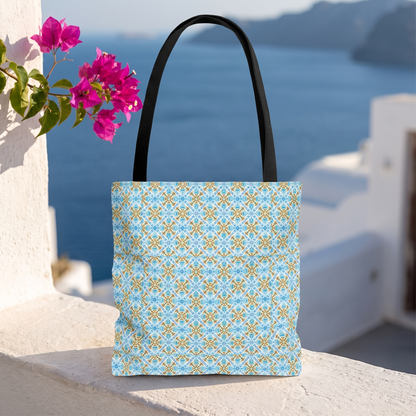 Mediterranean Mosaic Tote Bag on a whitewashed stone ledge above the blue Mediterranean sea