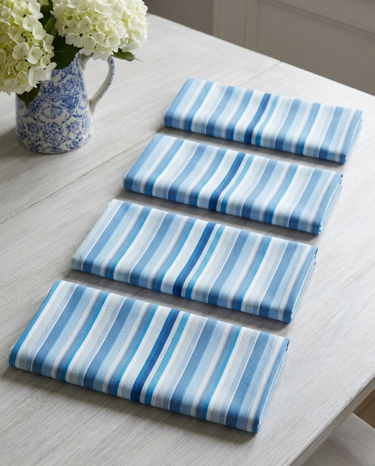Shades of Light Blue Stripes dinner napkins, set of four, elongated fold