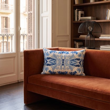Blue Spanish Tile lumbar pillow styled in a Barcelona-inspired library