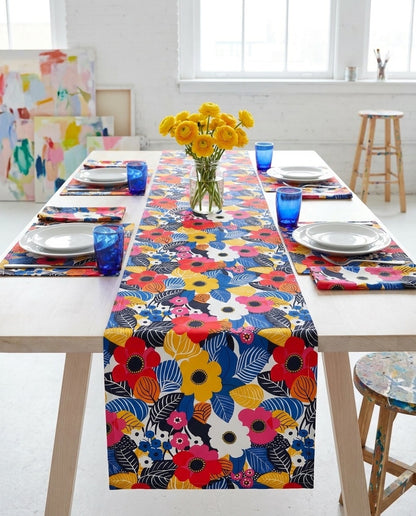 Blossom Burst table runner styled straight-on with matching placemats and napkins