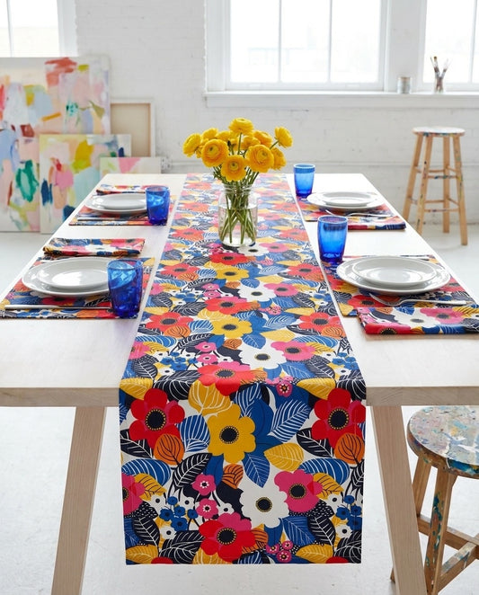 Blossom Burst table runner styled straight-on with matching placemats and napkins