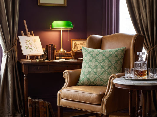 Emerald Flourish square throw pillow in its unique interior setting
