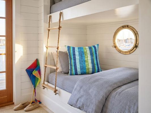 Ocean Whisper Stripes square throw pillow in its unique interior setting
