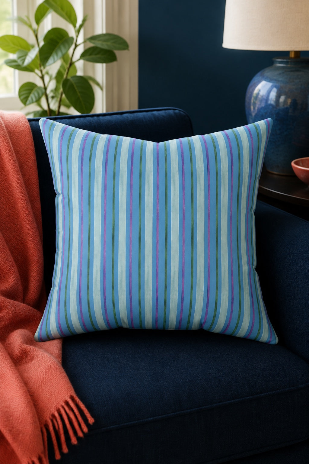 Stripe Hype square throw pillow with blue striped design in a modern navy room